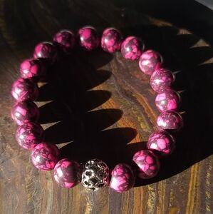 Hand crafted clay polymer bead bracelet with silvertone accent bead